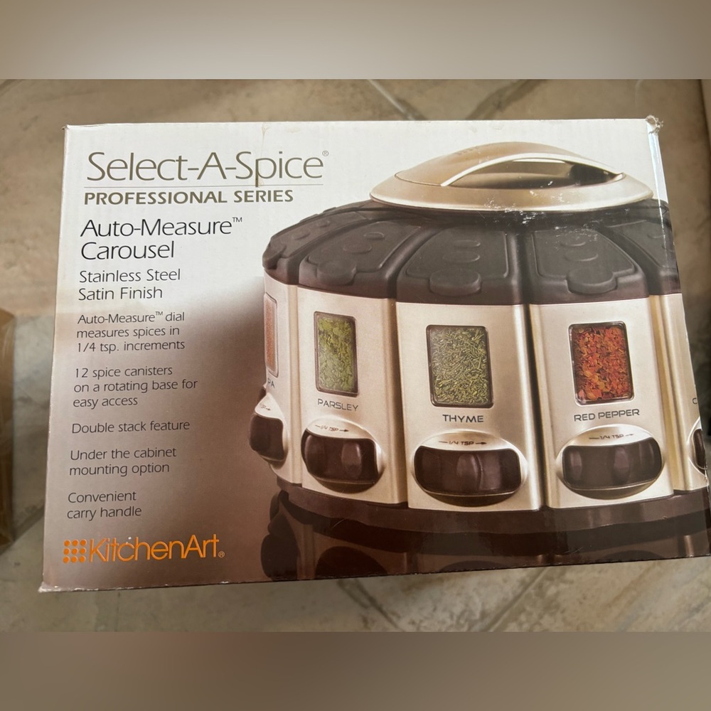 12 spice canisters arranged on a rotating base for easy access.  ￼